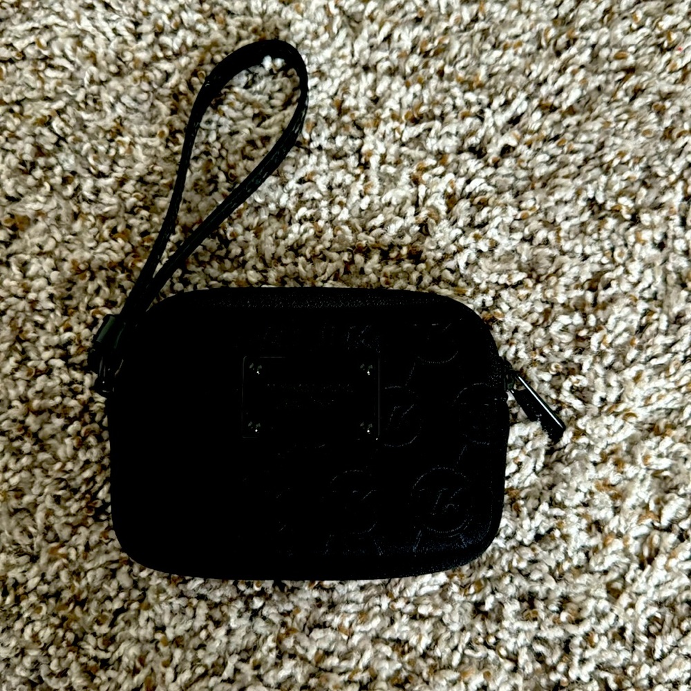 Michael Kors blavk neoprene wristlet with black patwnt leather strap -